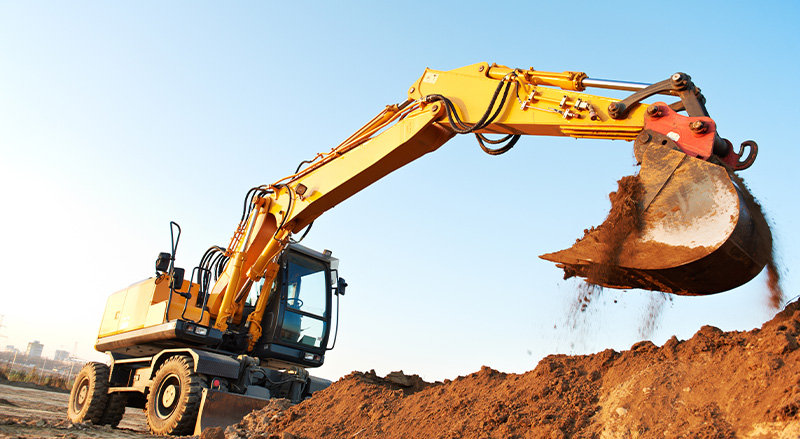 Excavator digging dirt