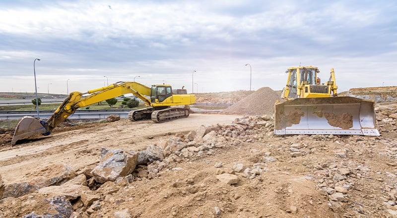 construction equipment working with a construction zone.